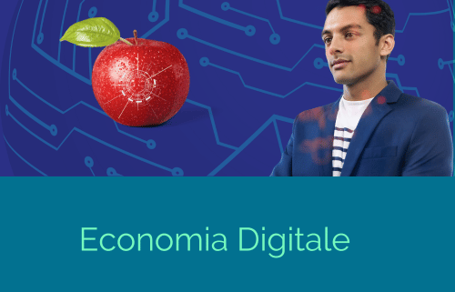 Un uomo osserva una mela rossa digitalizzata Economia digitale